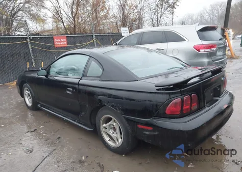 1997 Ford Mustang из США, поврежденный, VIN 1FALP4045VF110894
